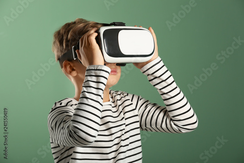 Cute boy with virtual reali...