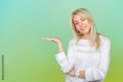 Caucasian isolated blond woman presenting with her hands