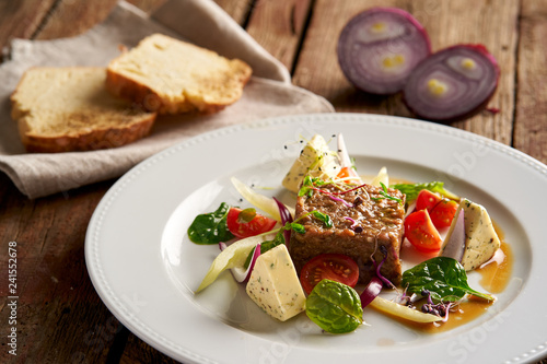 Tatar beefsteak with capers and herb butter