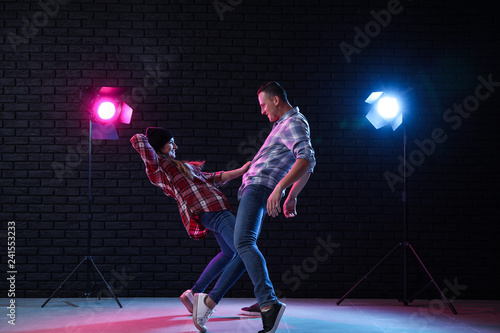 Young couple dancing in club © Pixel-Shot