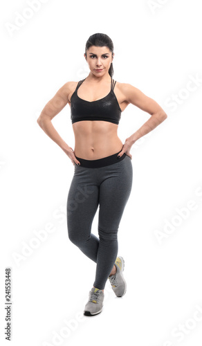 Sporty muscular woman on white background