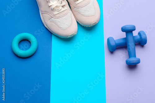 Fitness Gym equipment on color background