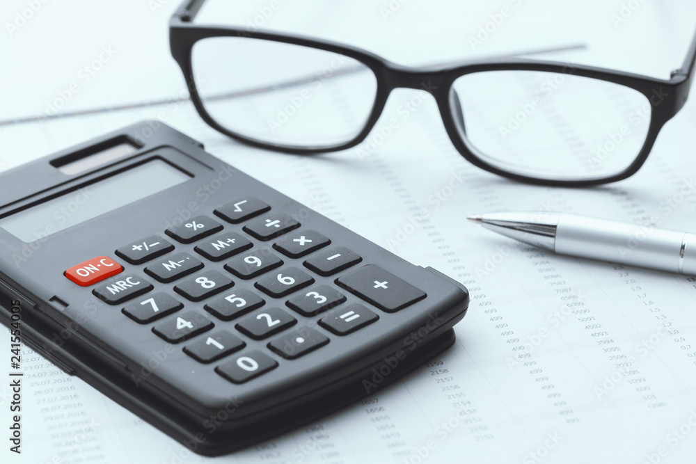 Business still life with calculator on table in office. Business still life with calculator on table in office.
