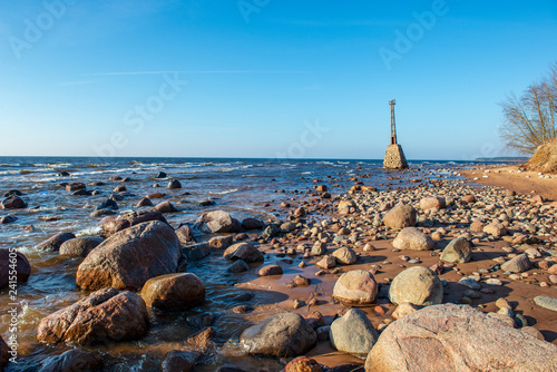 lighthouse by the sea photo