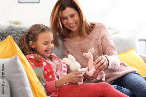 Happy mother with daughter ...