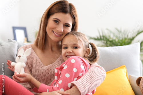 Portrait of happy mother wi...