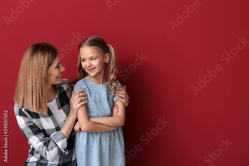 Portrait of happy mother wi...