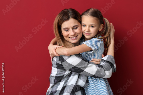 Portrait of happy mother wi...