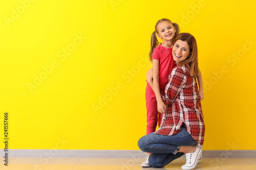 Portrait of happy mother wi...