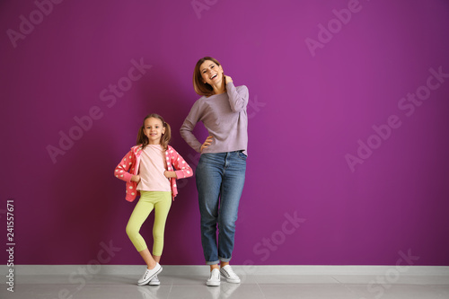 Portrait of happy mother wi...