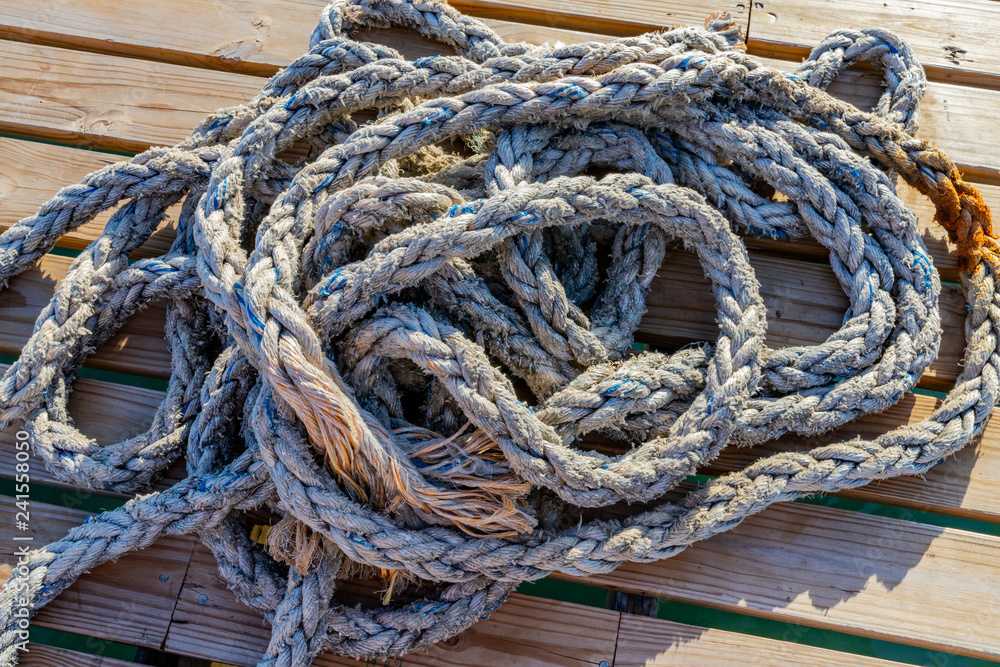 Coiled rope on jetty 