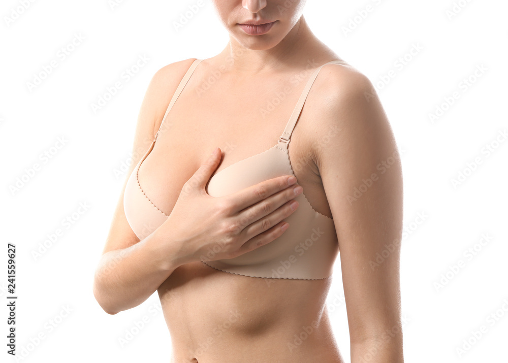Young woman with beautiful breast on white background Stock Photo