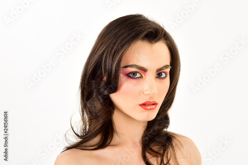 Giving your eyes some serious pop. Pretty woman wear creative makeup. A beauty of a girl. Applying decorative cosmetics and makeup. Sexy woman with color cosmetics. Beauty model with glamour look