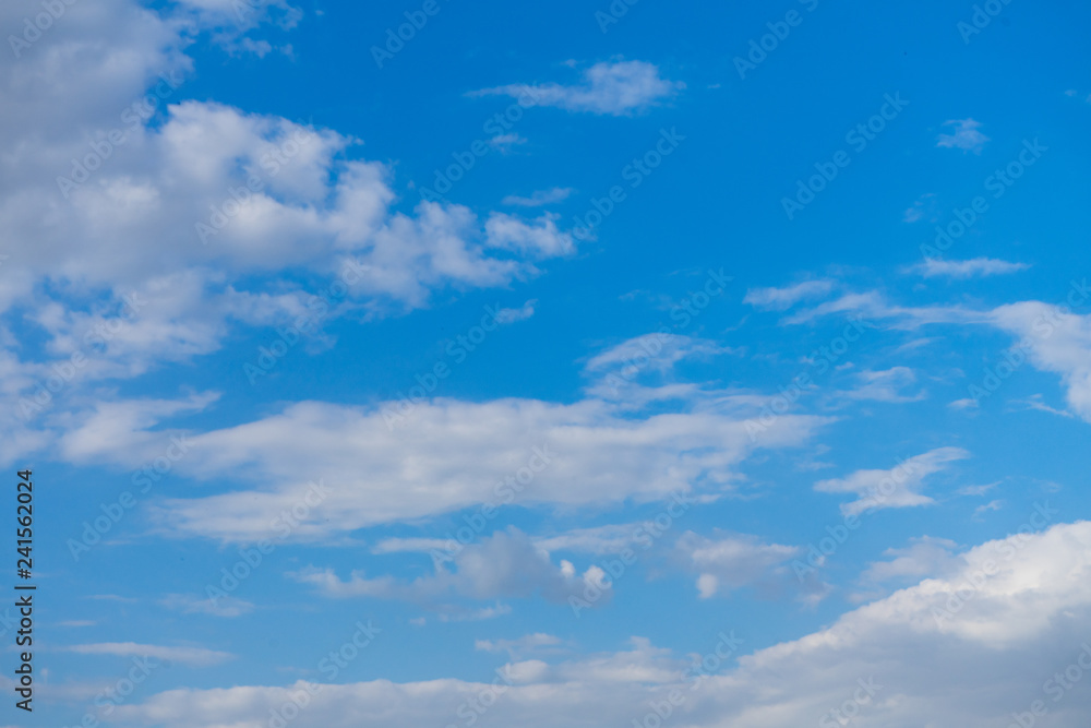 Fototapeta premium Beautiful blue sky with clouds and sunlight.