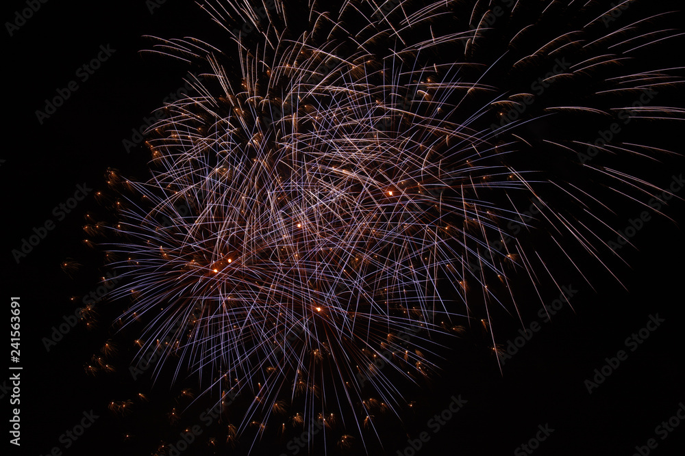 Obraz premium Abstract colored firework background with free space for text