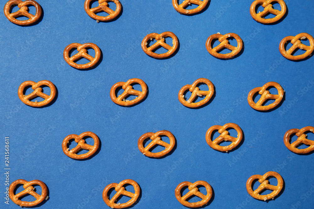Tasty salty cookies on color background Tasty salty cookies on color background