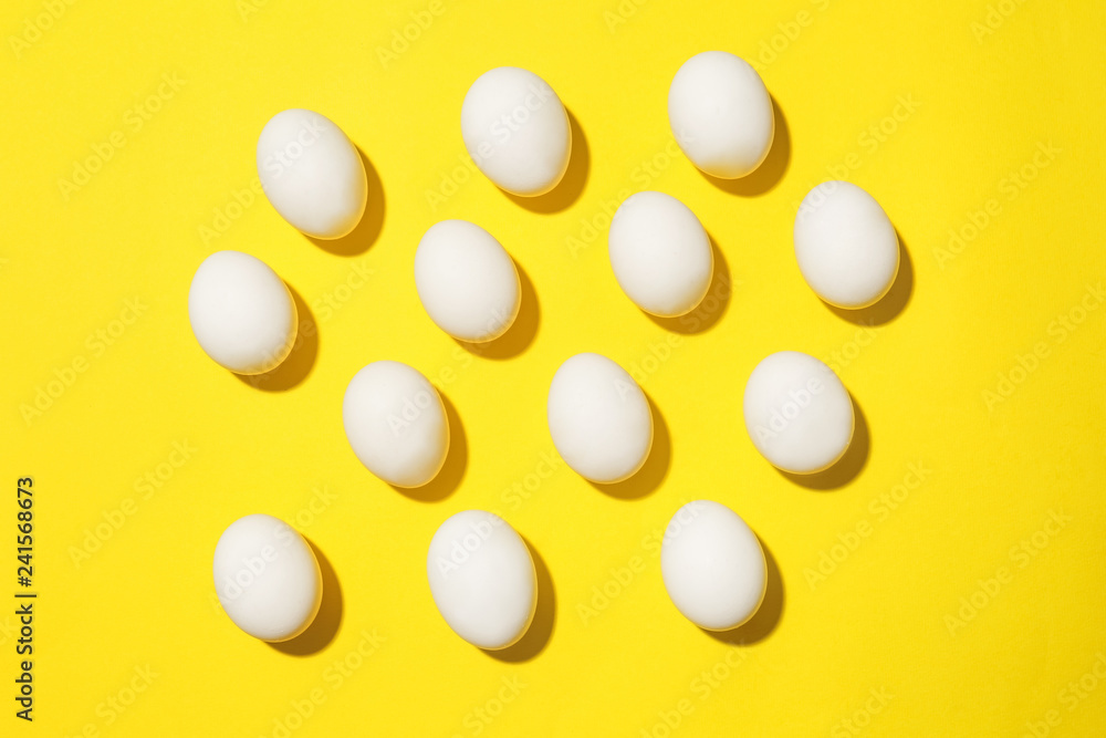 Many chicken eggs on color background Many chicken eggs on color background