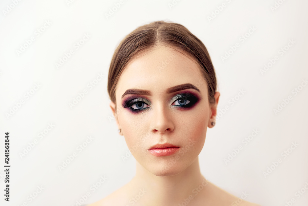 Beautiful model girl with Fashion Luxury Makeup, long eyelashes, perfect skin facial make-up. Beauty Brunette model woman holiday make up close up. Eyelash extensions, false eyelashes. Beautiful model girl with Fashion Luxury Makeup, long eyelashes, perfect skin facial make-up. Beauty Brunette model woman holiday make up close up. Eyelash extensions, false eyelashes.