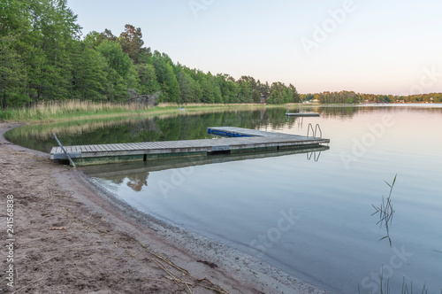 An idyllic bathing place at Värmd at sunset photo