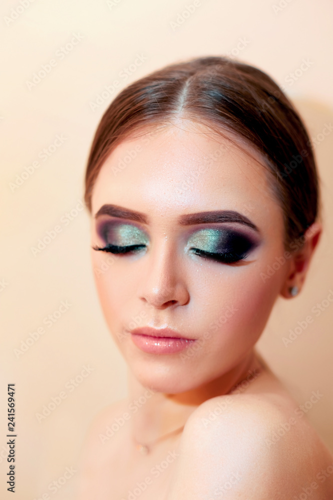 Beautiful model girl with Fashion Luxury Makeup, long eyelashes, perfect skin facial make-up. Beauty Brunette model woman holiday make up close up. Eyelash extensions, false eyelashes. Beauty Woman Beautiful model girl with Fashion Luxury Makeup, long eyelashes, perfect skin facial make-up. Beauty Brunette model woman holiday make up close up. Eyelash extensions, false eyelashes. Beauty Woman