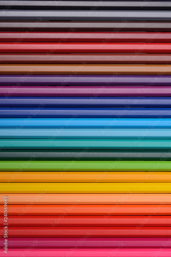 vertical background created from wooden colored pencils vertical background created from wooden colored pencils