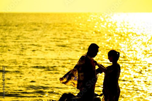 silhouette people are lovely on the beach