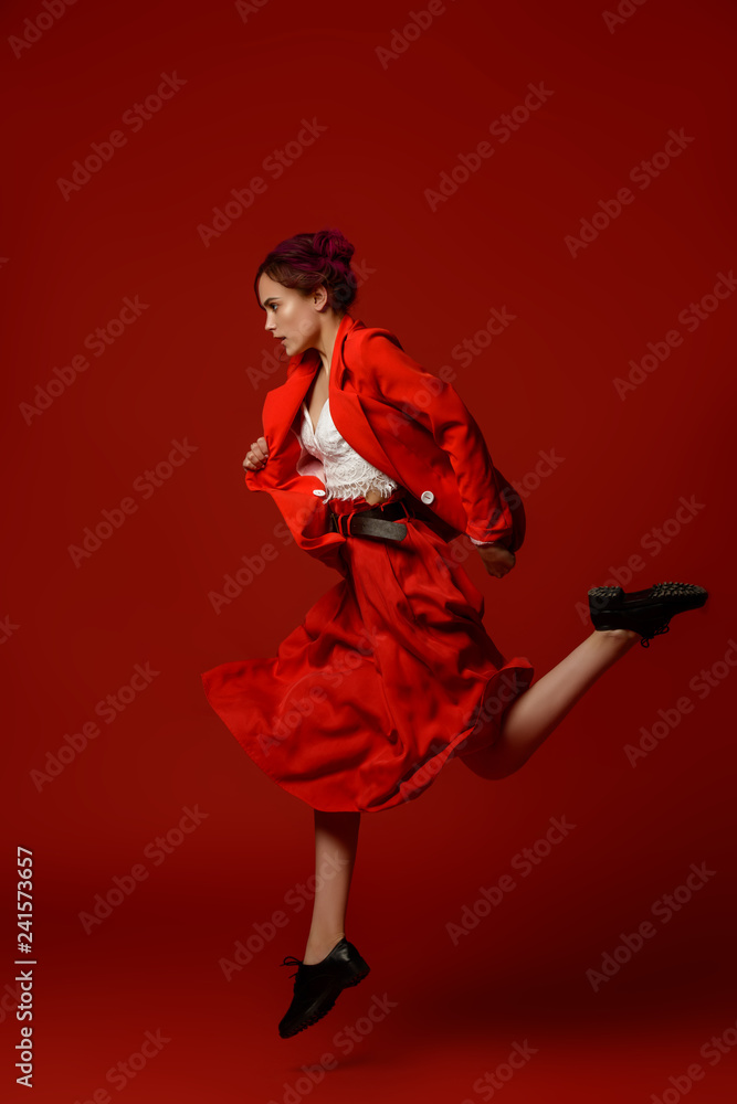 jumping young woman jumping young woman