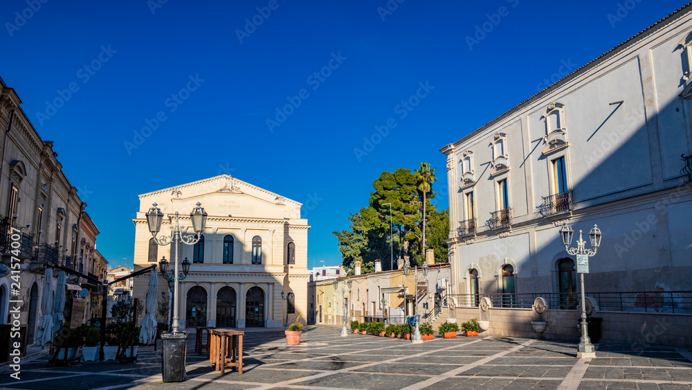 Municipal Theater Saverio Mercadante, 1868. Facade with two galleries. Ancient building, balconies, iron railings, liberty style street lamps. In piazza Giacomo Matteotti, in Cerignola, Puglia, Italy.