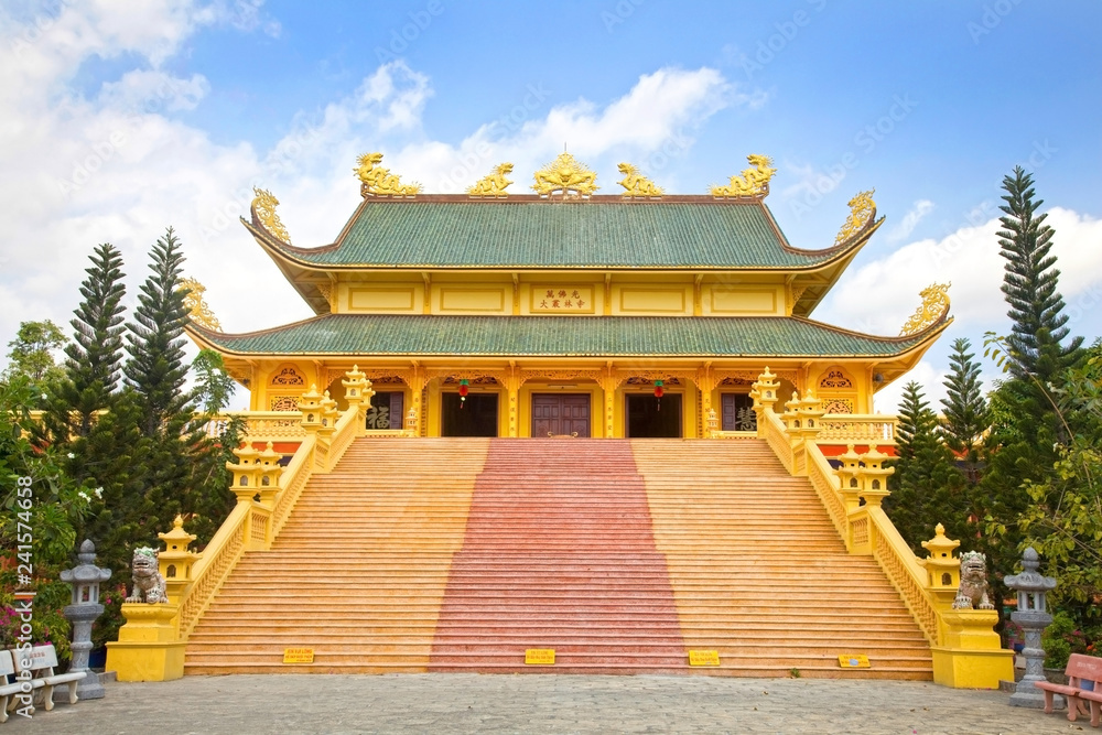 Golden Buddhist temple, Phu My, Vietnam.