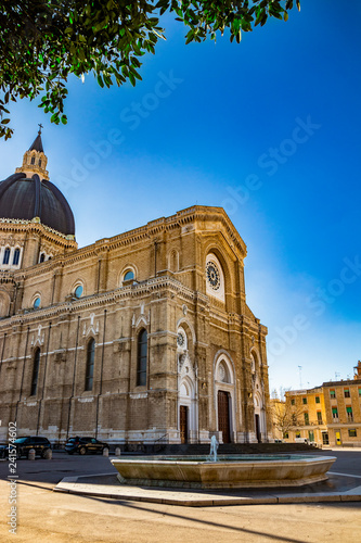 Cathedral of San Pietro Apostolo, also known as Duomo Tonti, by Paolo Tonti, who donated his wealth for its construction. Facade, rose windows, portals, dome and fountain. Cerignola, Puglia, Italy. photo