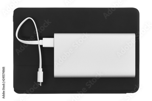 Powerbank battery charger with tablet pc. Top view.