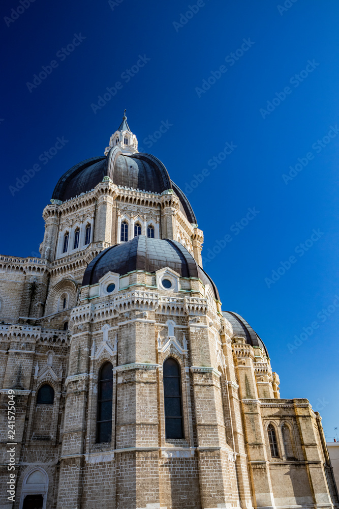 Cathedral of San Pietro Apostolo, also known as Duomo Tonti, by Paolo Tonti, who donated his wealth for its construction. Exterior of the dome and the apses. Cerignola, Puglia, Italy.