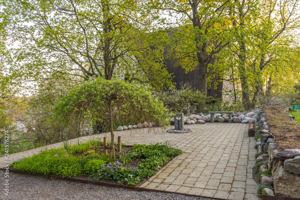 Memorial grove at Värmdö church in Stockholm one spring evening Memorial grove at Värmdö church in Stockholm one spring evening