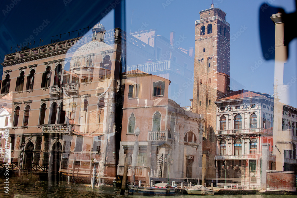 Venice in the window reflection