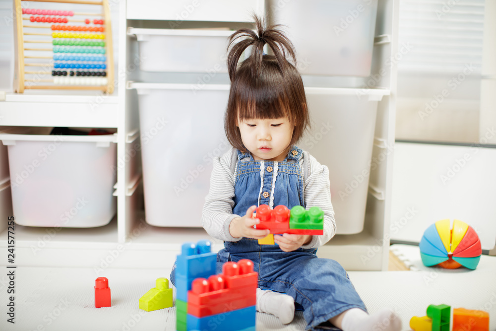 toddler baby girl play toy blocks at home toddler baby girl play toy blocks at home