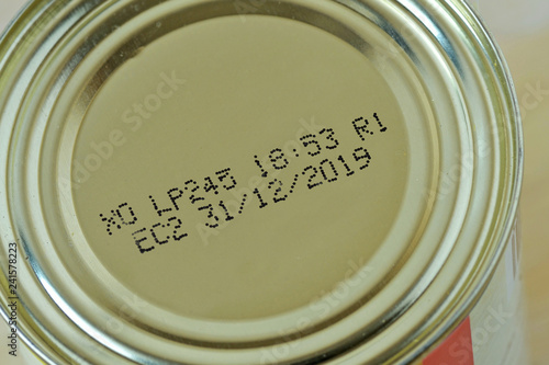 Close-up of 2019 expiration date on canned food