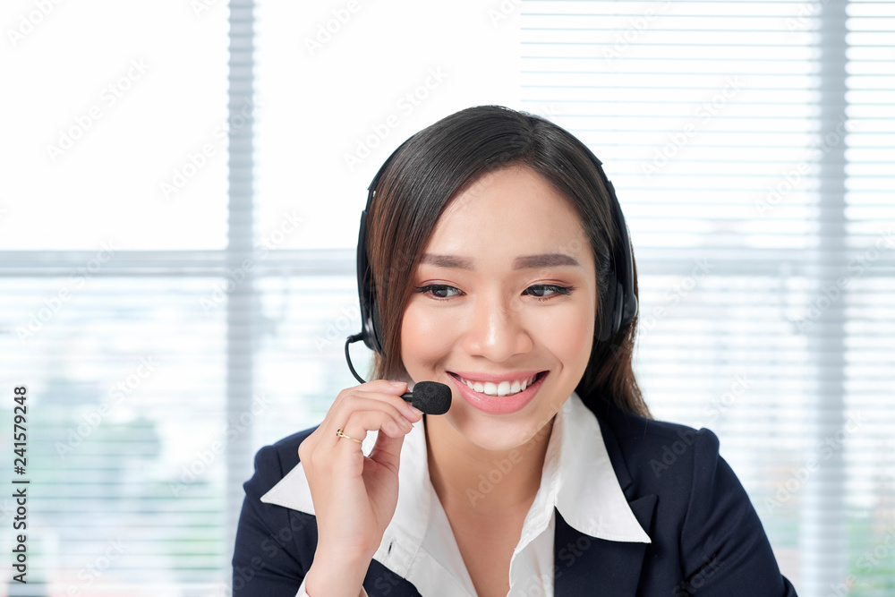 Call center operators. Young beautiful business woman in headset