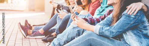 Millennials friends watching social story on smart mobile phones