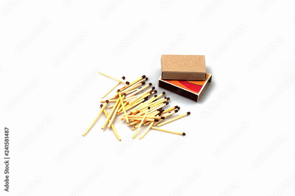 Closeup view of matchbox and matches isolated on white background. Closeup view of matchbox and matches isolated on white background.