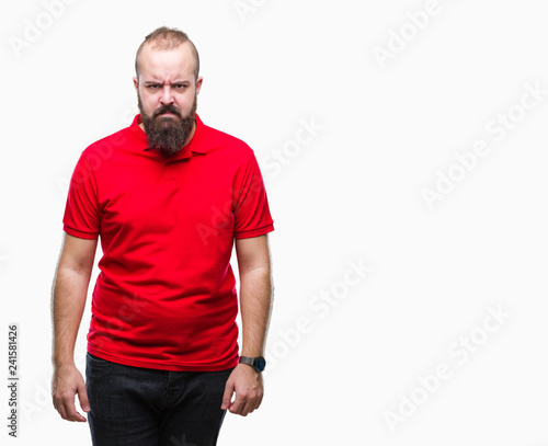 Young caucasian hipster man wearing red shirt over isolated background skeptic and nervous, frowning upset because of problem. Negative person.