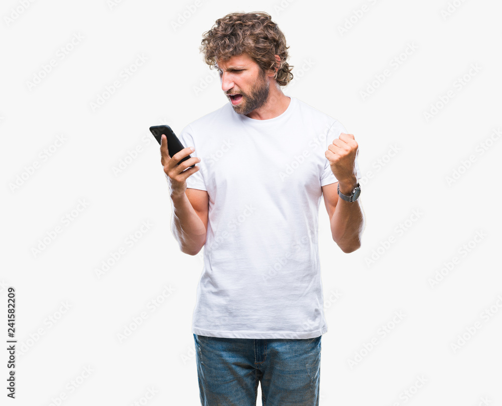 Handsome hispanic man model sending message texting using smartphone over isolated background screaming proud and celebrating victory and success very excited, cheering emotion Handsome hispanic man model sending message texting using smartphone over isolated background screaming proud and celebrating victory and success very excited, cheering emotion