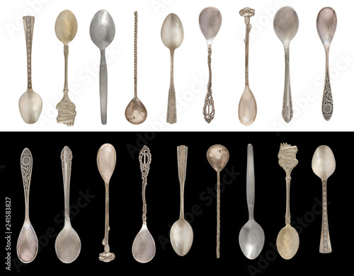 9 Vintage Tea Spoons isolated on a black and white background. Rustic style. Silverware.
