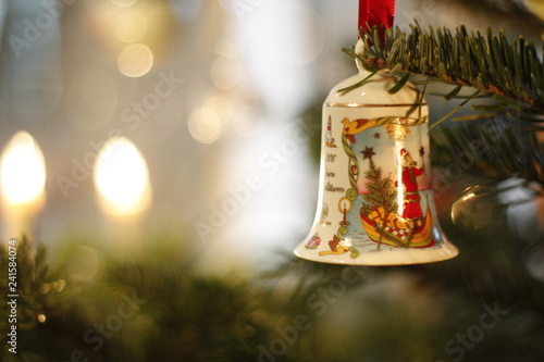 Christmas Bell hanging on a christmas tree with nice Bokeh 