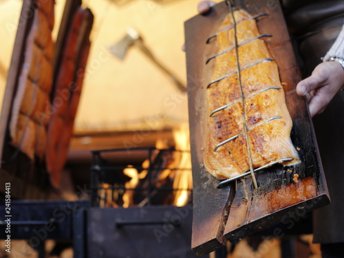 Flammlachs - Salmon on wood infront of a fire