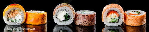 baked hot sushi rolls on a dark background. Hot fried Sushi Roll Sushi menu