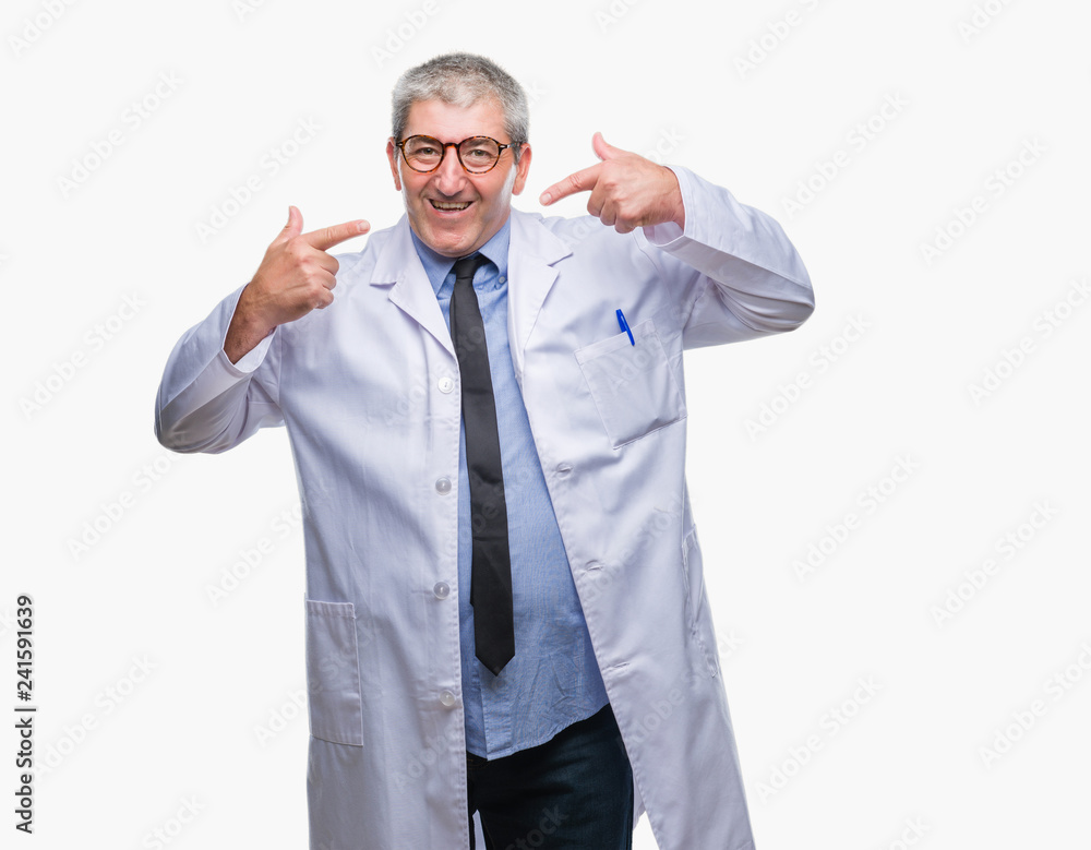 Handsome senior doctor, scientist professional man wearing white coat over isolated background smiling confident showing and pointing with fingers teeth and mouth. Health concept. Handsome senior doctor, scientist professional man wearing white coat over isolated background smiling confident showing and pointing with fingers teeth and mouth. Health concept.
