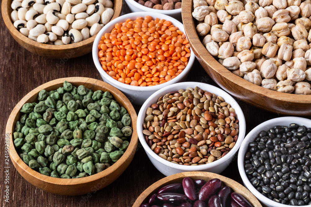Fototapeta premium Various assortment of indian legumes - beans, chickpeas, lentils, dal top view.