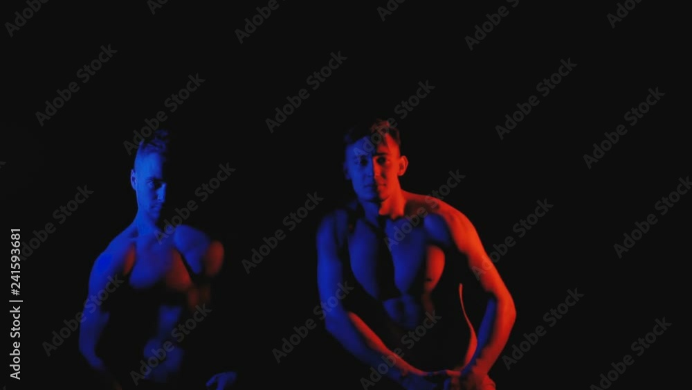 Two funny guys in color lights Two funny guys in color lights
