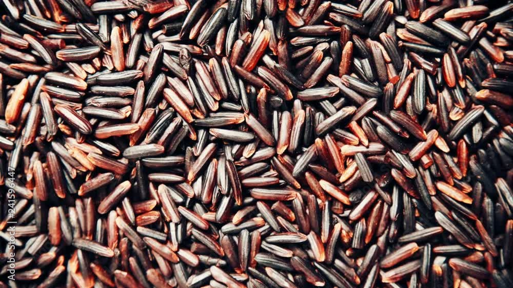 Black rice as natural food background. Top view. Healthy diet gluten free Black rice as natural food background. Top view. Healthy diet gluten free