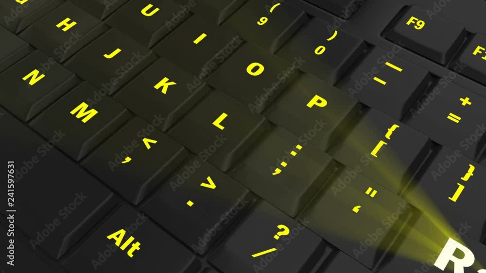 pointing the camera on yellow glowing Rate key on black computer keyboard pointing the camera on yellow glowing Rate key on black computer keyboard